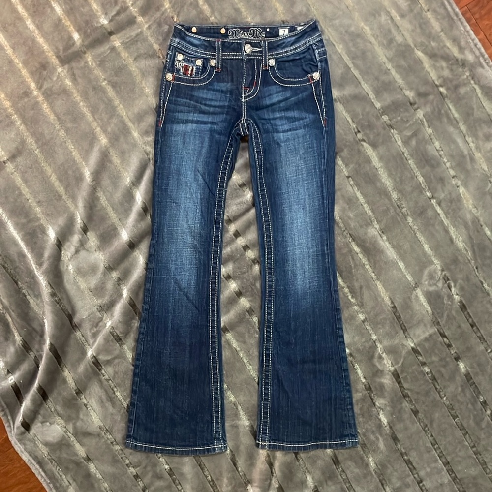 Miss Me boot cut jeans in line new condition. Girls size 7